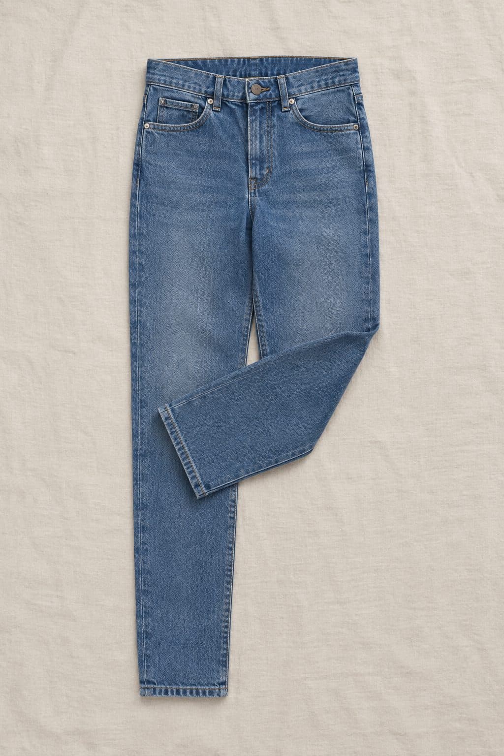 Slim Mid Stretch, laid flat on linen