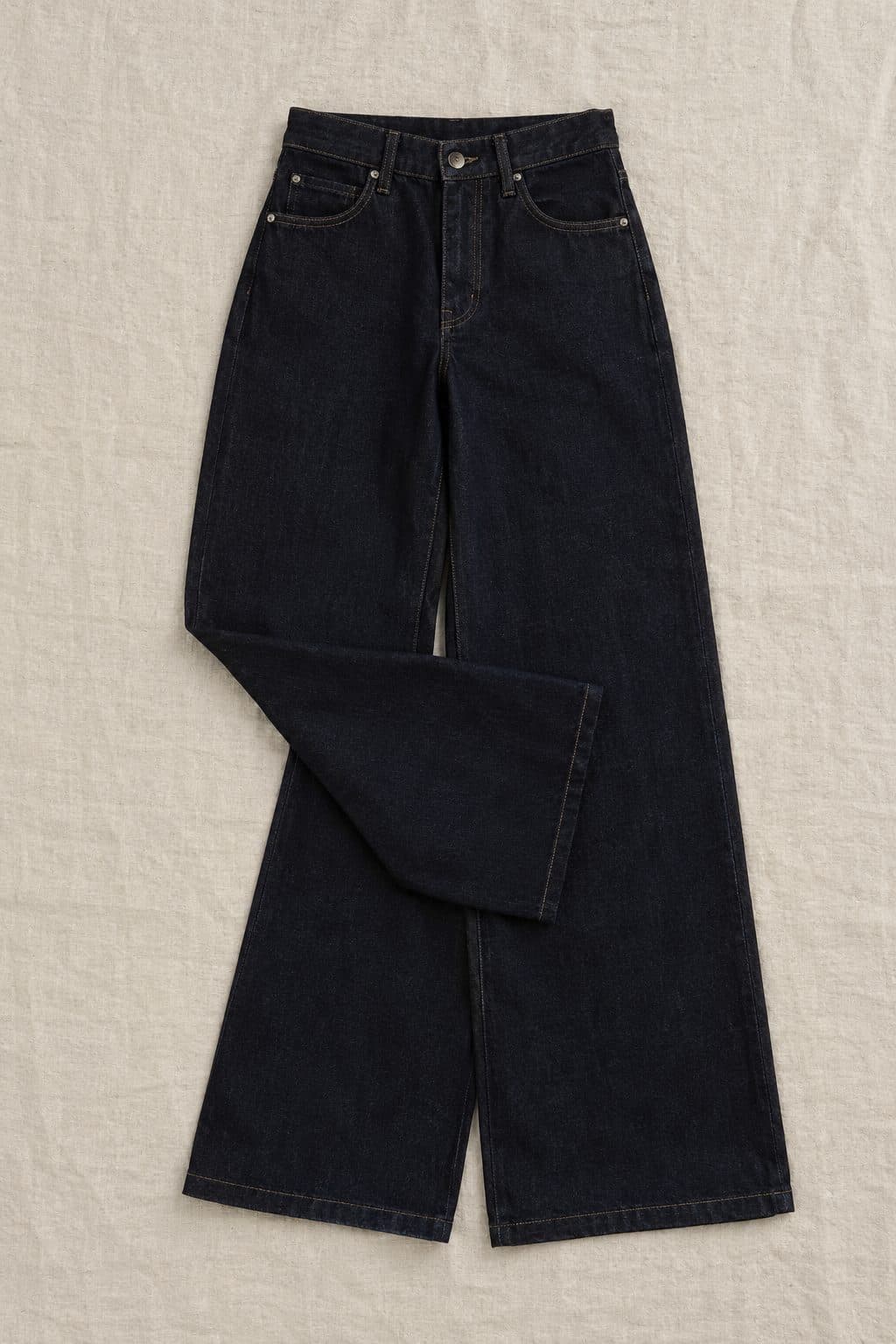 Wide Leg Rinse, laid flat on linen