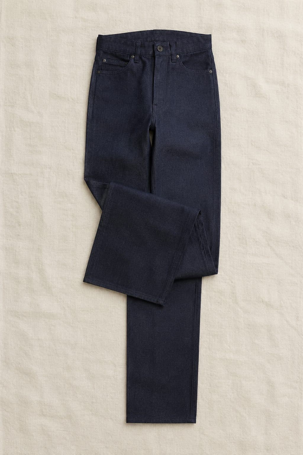 Raw Straight 14oz, laid flat on linen