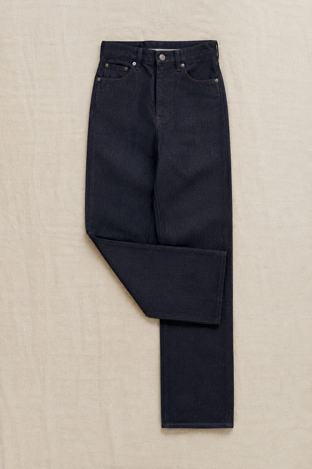 Raw Straight 21oz, laid flat on linen