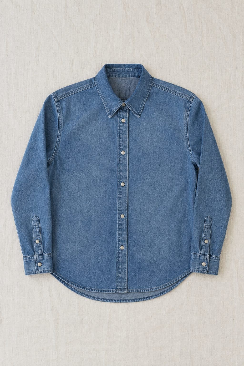 Denim Shirt Mid, laid flat on linen
