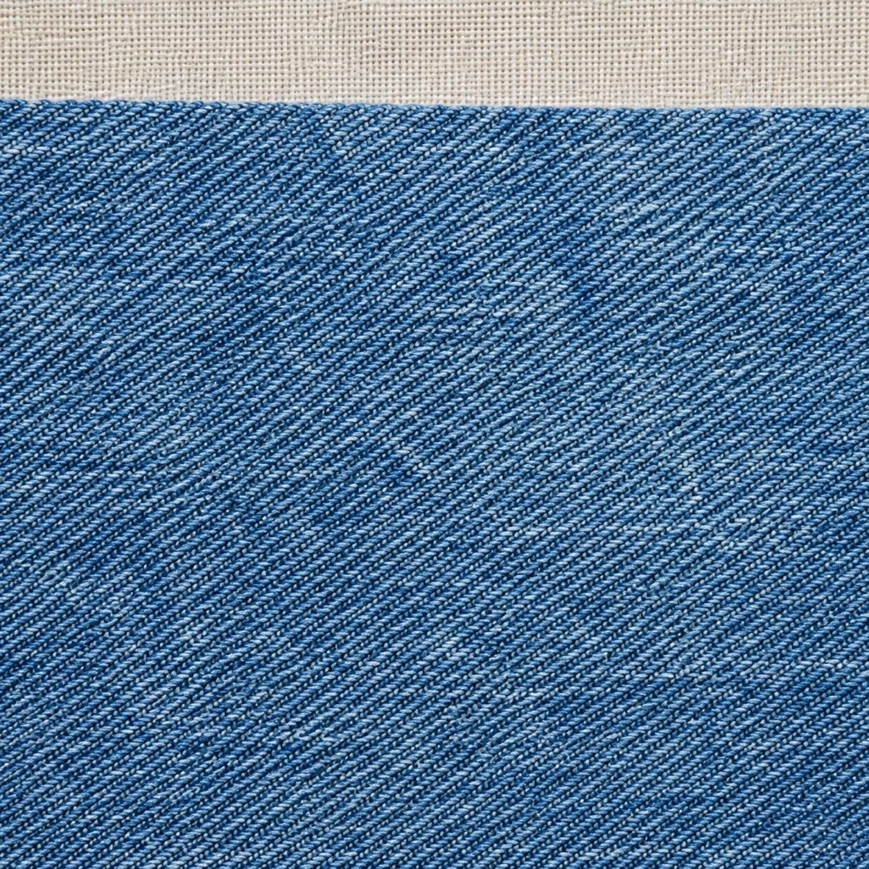 Macro of mid denim, twill line visible
